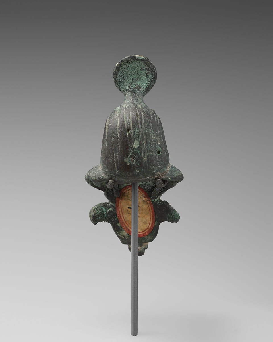 Finial with nemes and crowned figure, probably Osiris, Bronze