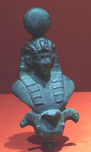 Finial with nemes and crowned figure, probably Osiris