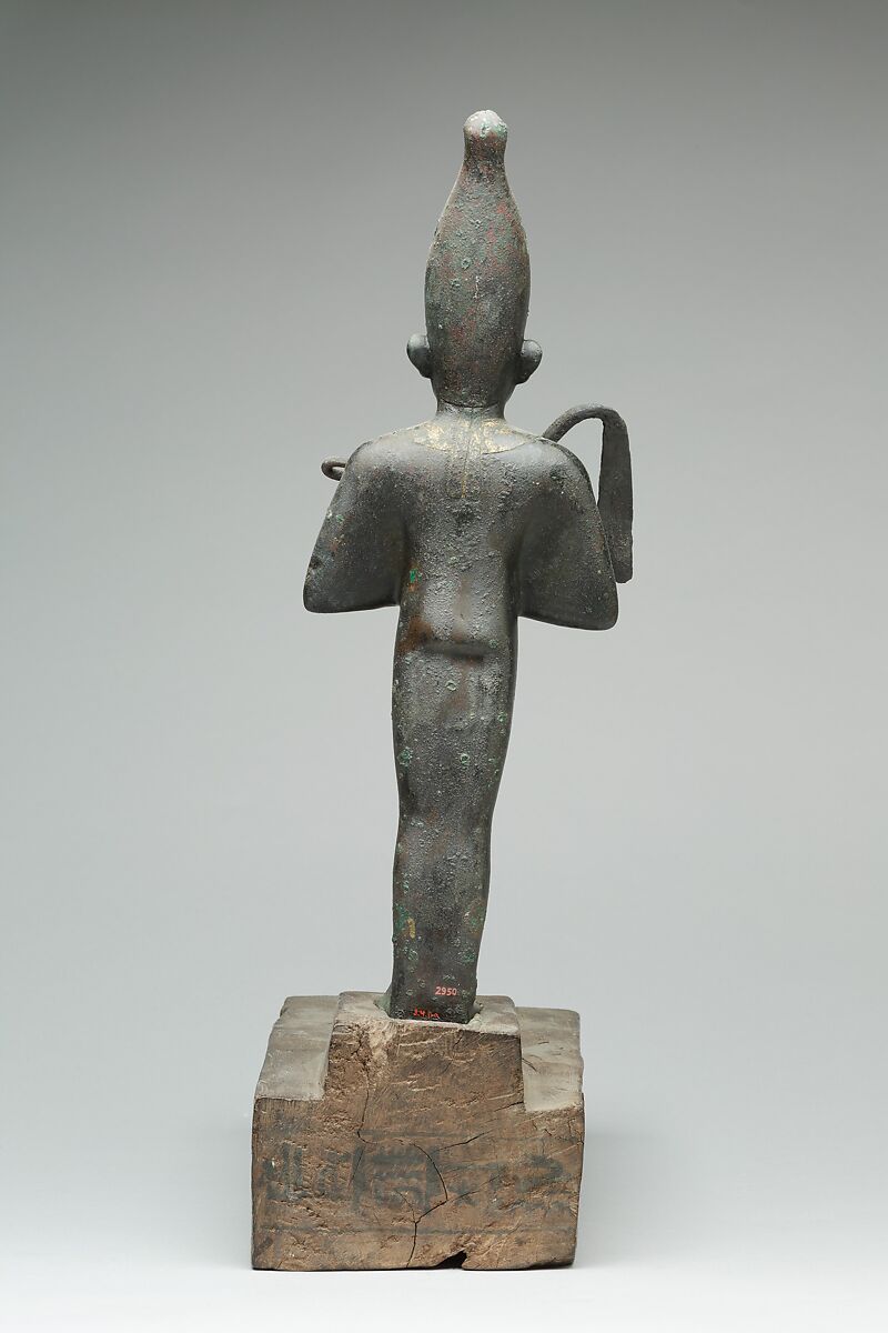 Osiris offered by the Astronomer of the House of Amun, Ibeb, Leaded bronze; precious-metal leaf; inlays of other materials; wood base with ink or black paint inscription