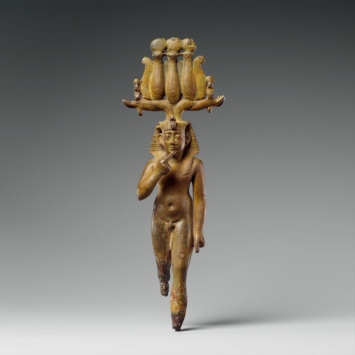 A child god, probably Harpokrates, Leaded bronze, formerly gilded 