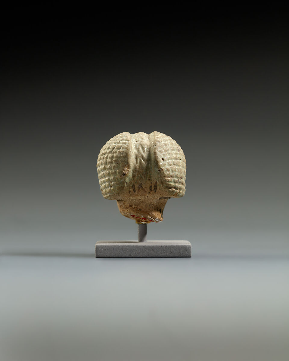 Head from a statuette, perhaps of  a dwarf, Faience