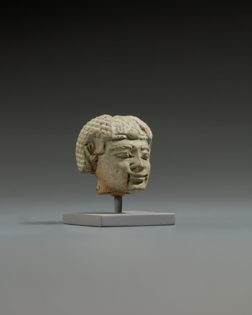 Head from a statuette, perhaps of  a dwarf, Faience