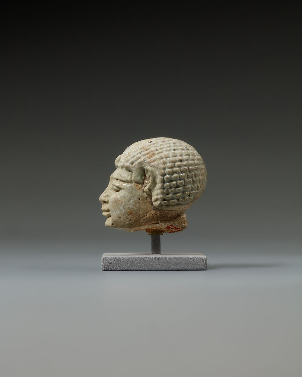 Head from a statuette, perhaps of  a dwarf, Faience