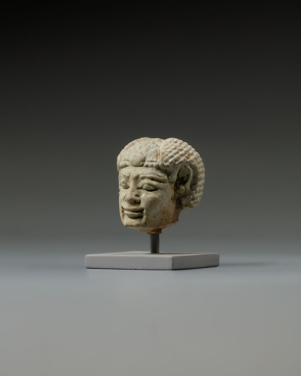 Head from a statuette, perhaps of  a dwarf, Faience