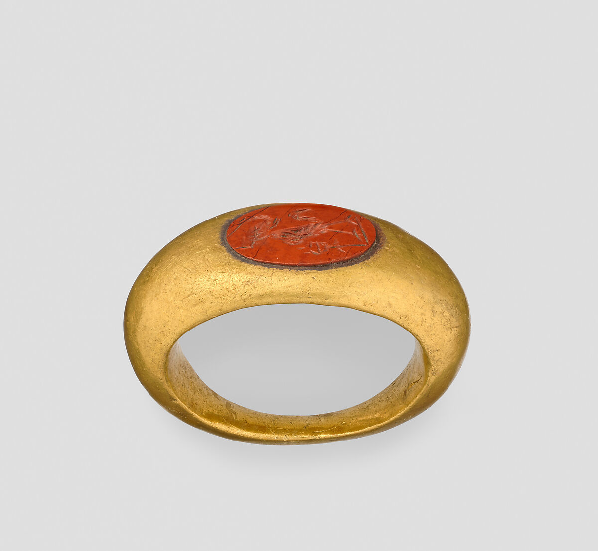 Ring with a gem with magical device of a composite figure with an unidentifiable object and a caduceus, Gold, jasper