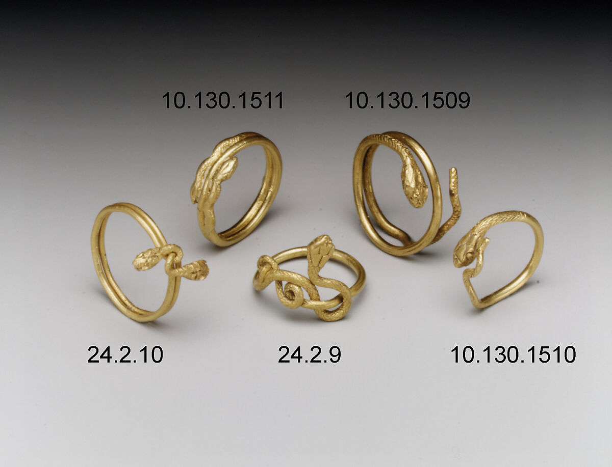 Ring with snake's head terminals twisted to form the bezel, gold