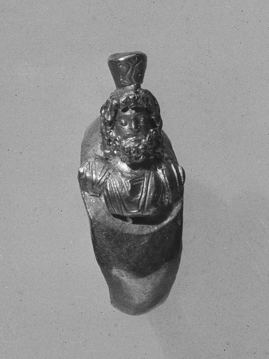 Ring with bezel in the form of a bust of Serapis, gold