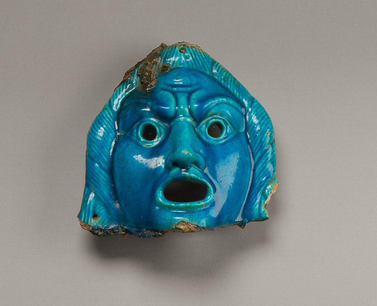 Theatrical mask for offering, faience 