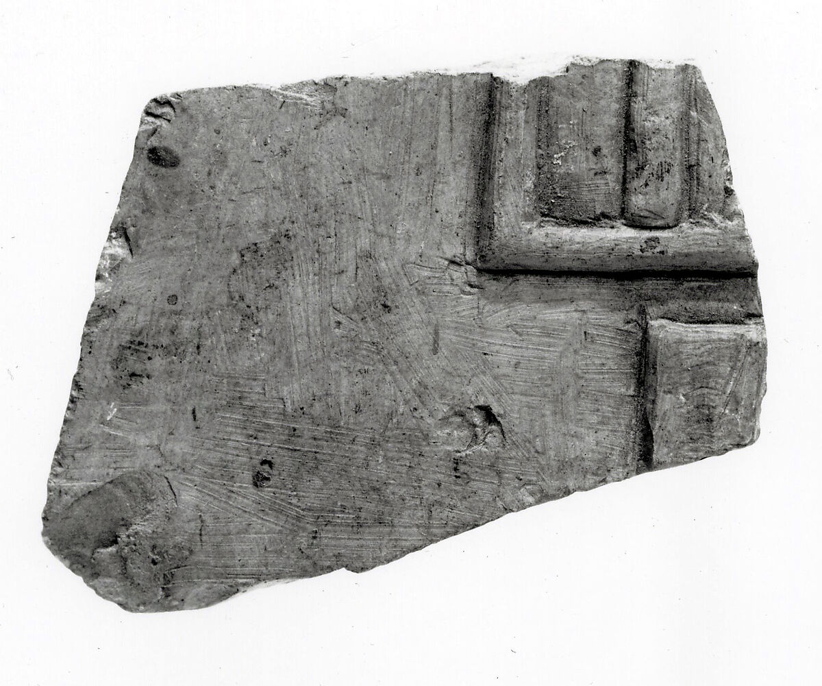 Raised relief fragment with hieroglyphs, Limestone