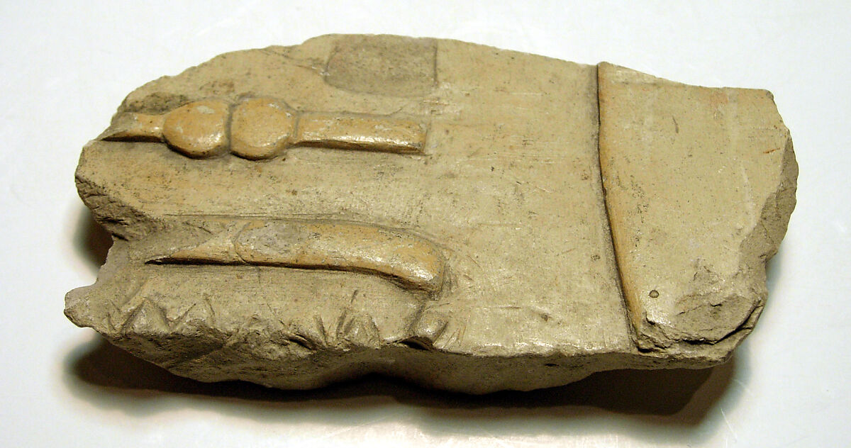 Raised relief fragment, Limestone, varnish 