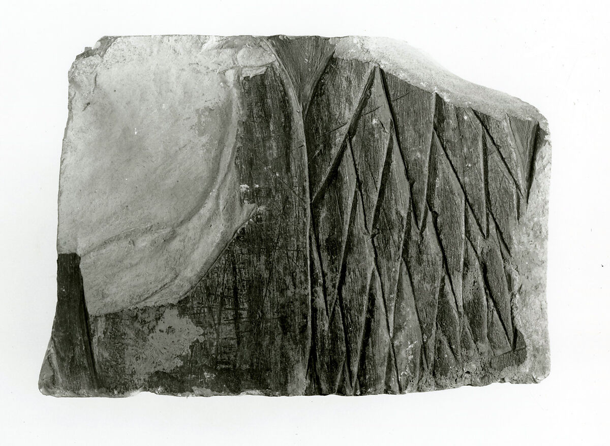 Raised relief fragment, Limestone, varnish 