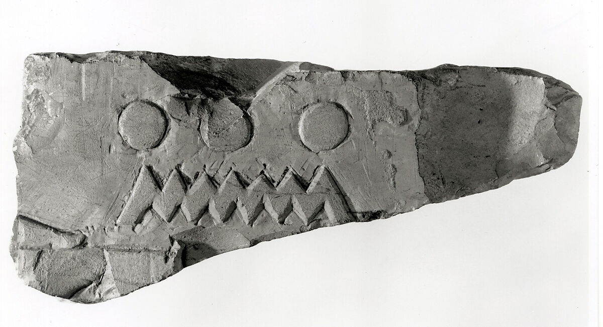 Raised relief fragment, Limestone, varnish 