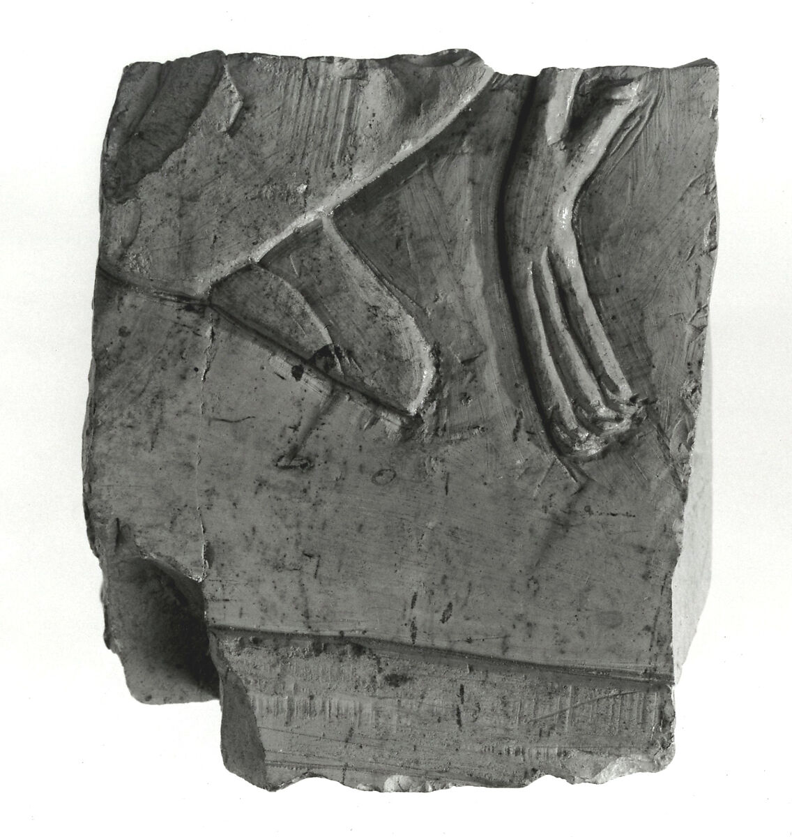 Raised relief fragment, Limestone, varnish 