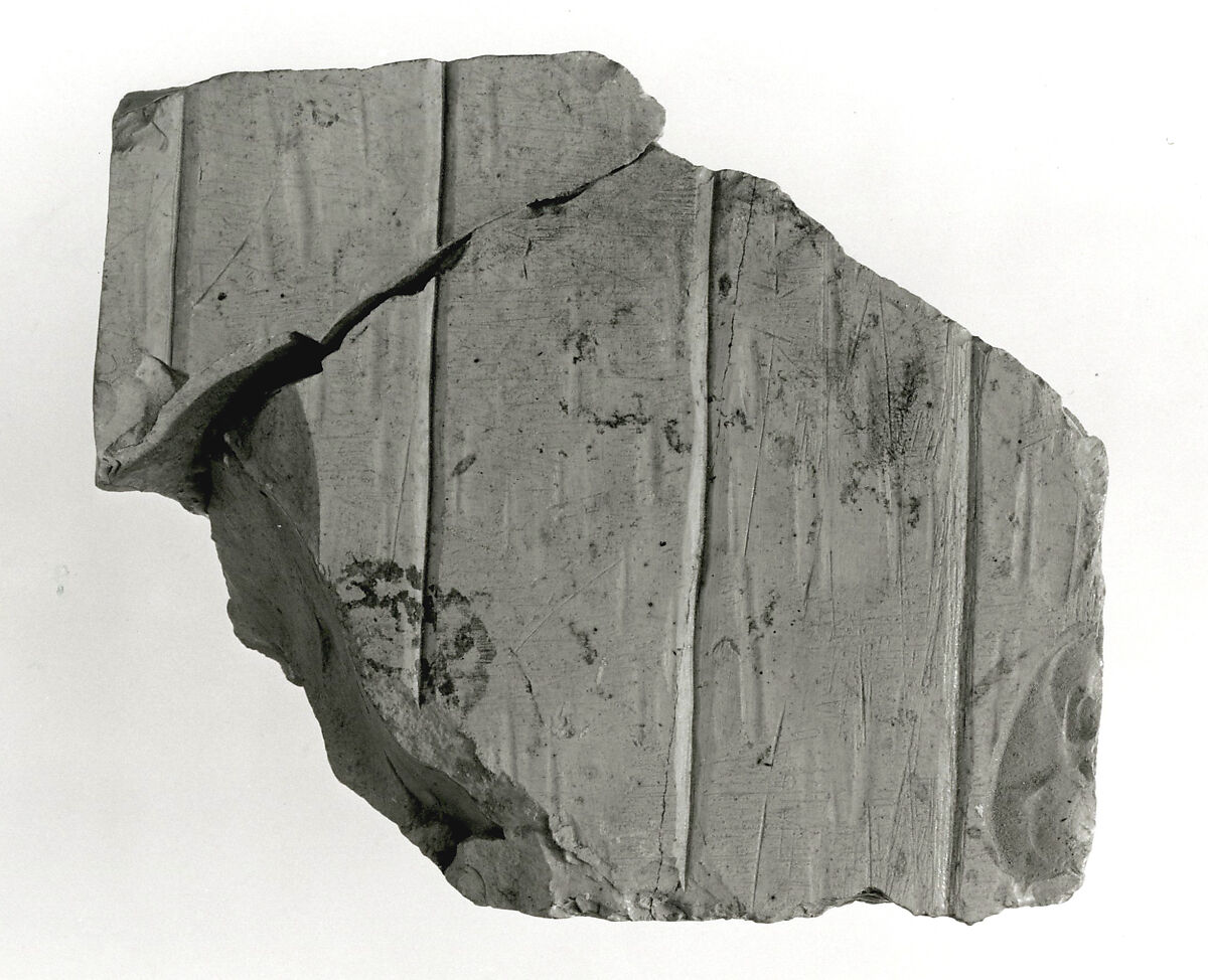 Raised relief fragment, Limestone, varnish 