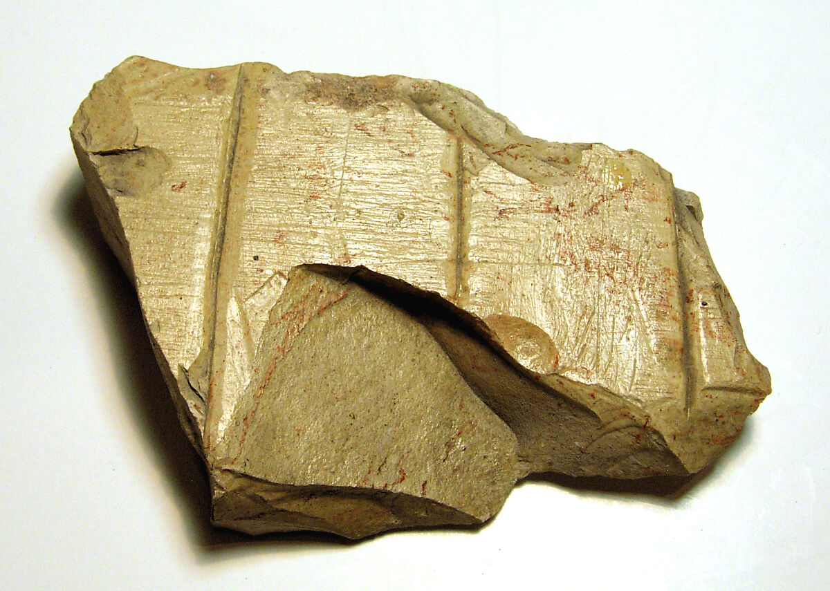 Raised relief fragment, Limestone, varnish 