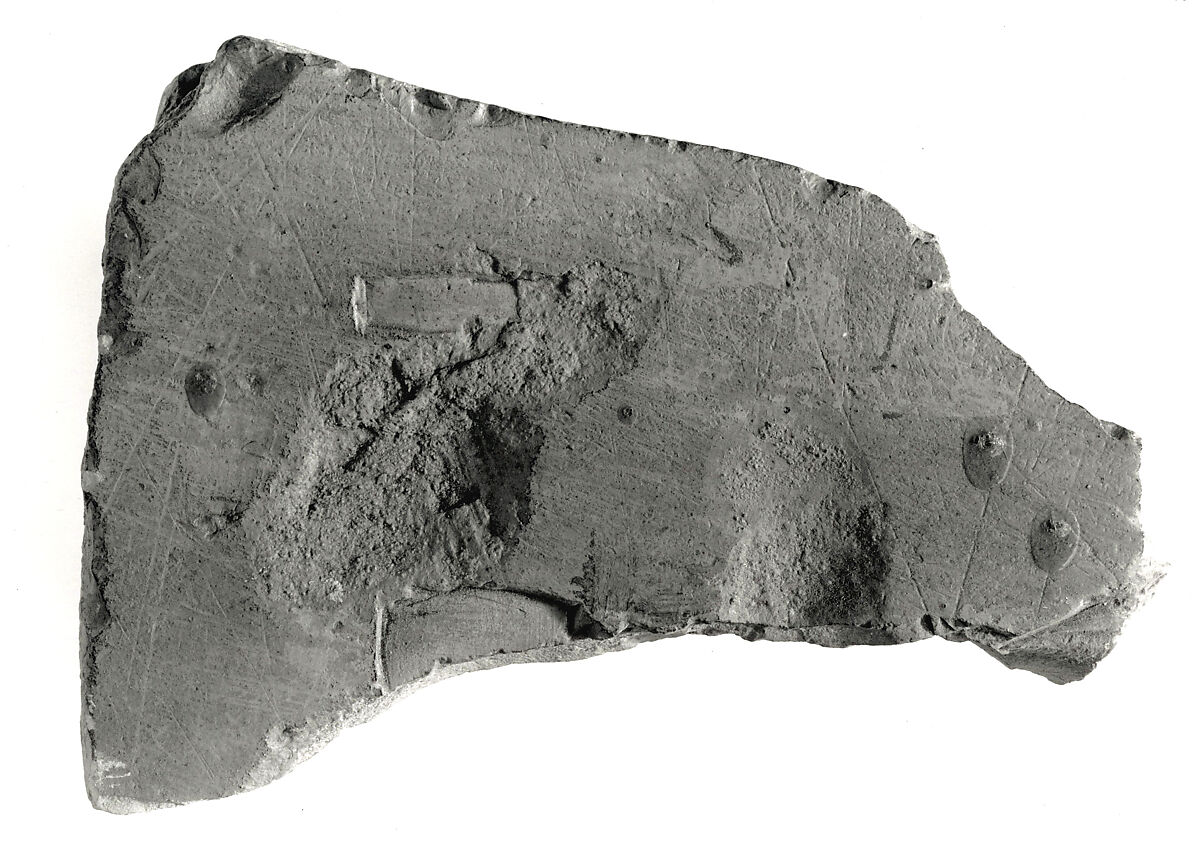 Sunk relief fragment, Limestone, mortar traces 