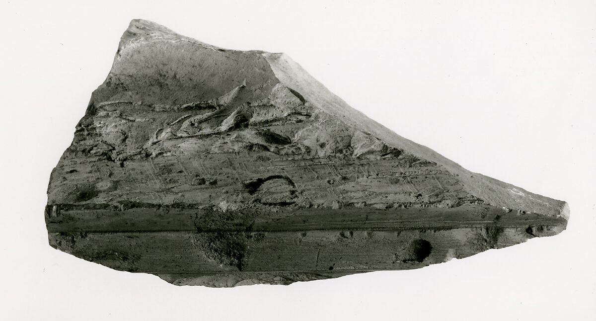 Raised relief fragment, Limestone, mortar 