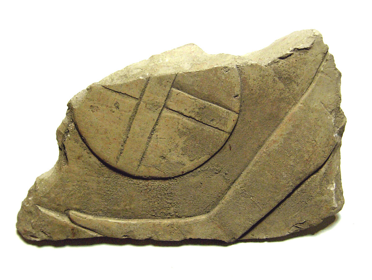 Raised relief fragment, Limestone, stains 