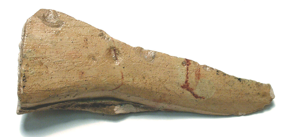Raised relief fragment, Limestone, mortar traces 