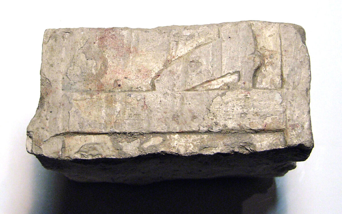 Raised relief fragment, Limestone, plaster traces 