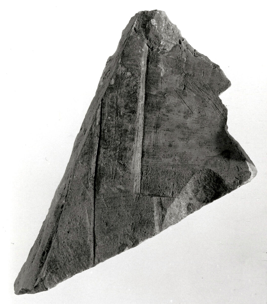 Raised relief fragment, Limestone, mortar traces 