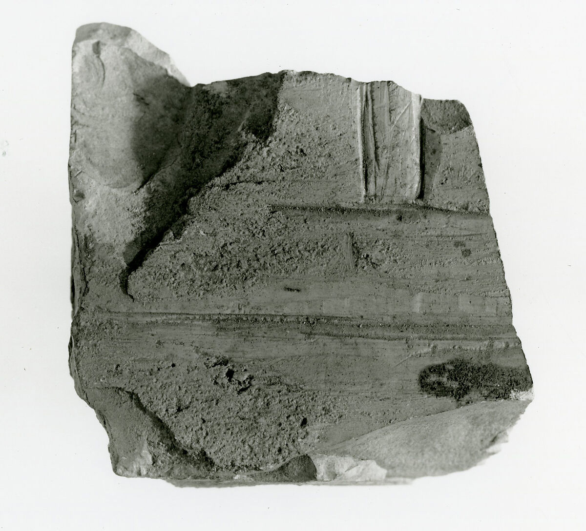 Sunk relief fragment, Limestone, mortar traces 