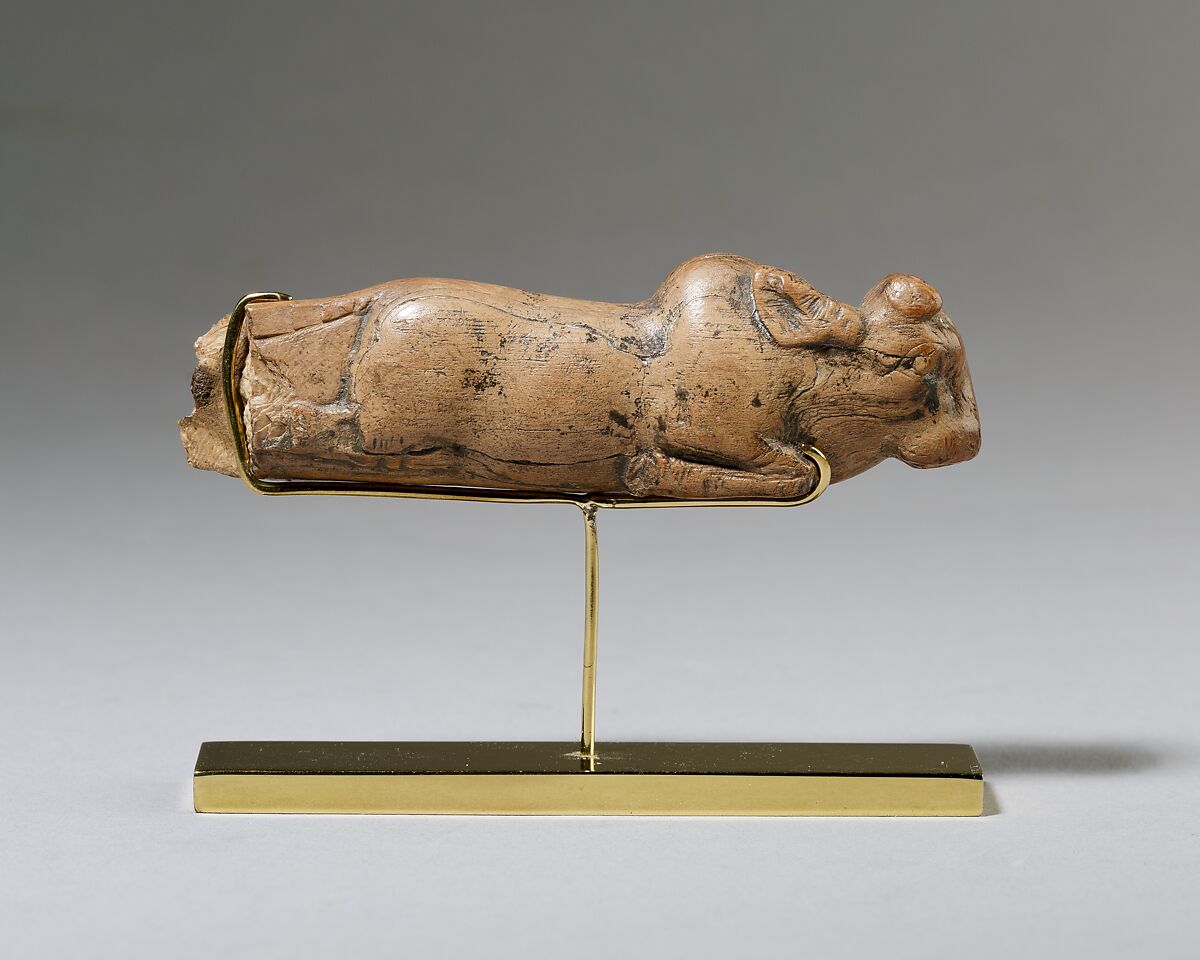Knife handle (?); Humped bull, Ivory (elephant)