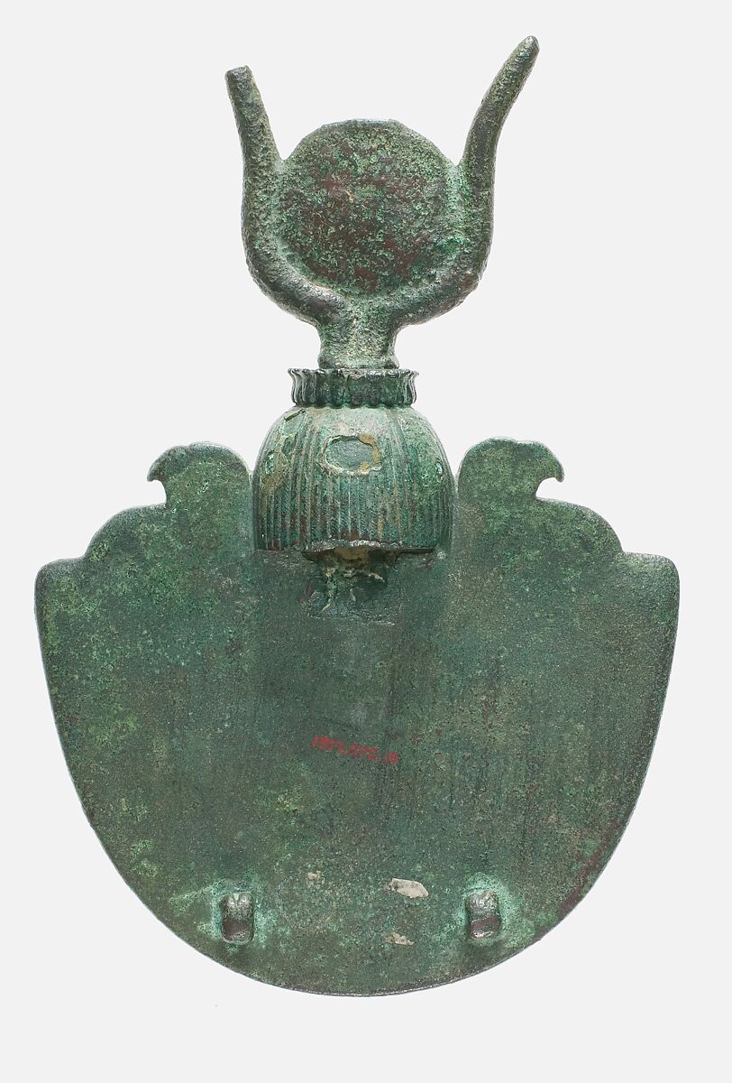 An aegis of Isis, Bronze or copper alloy, green glass, blue glass