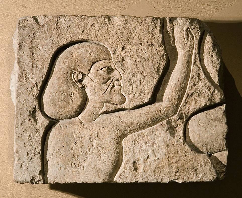 Relief fragment of an Asiatic raising his hands in adoration, Limestone 