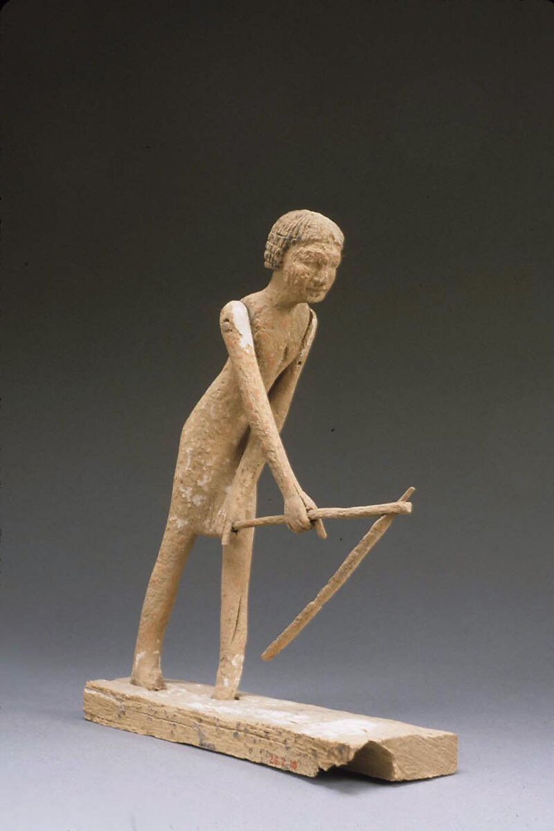 Statue of man hoeing from tomb of Tjeteti, Wood