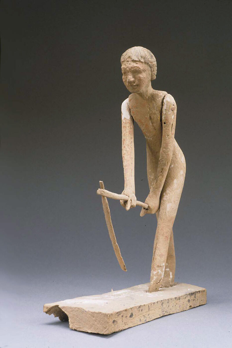 Statue of man hoeing from tomb of Tjeteti, Wood