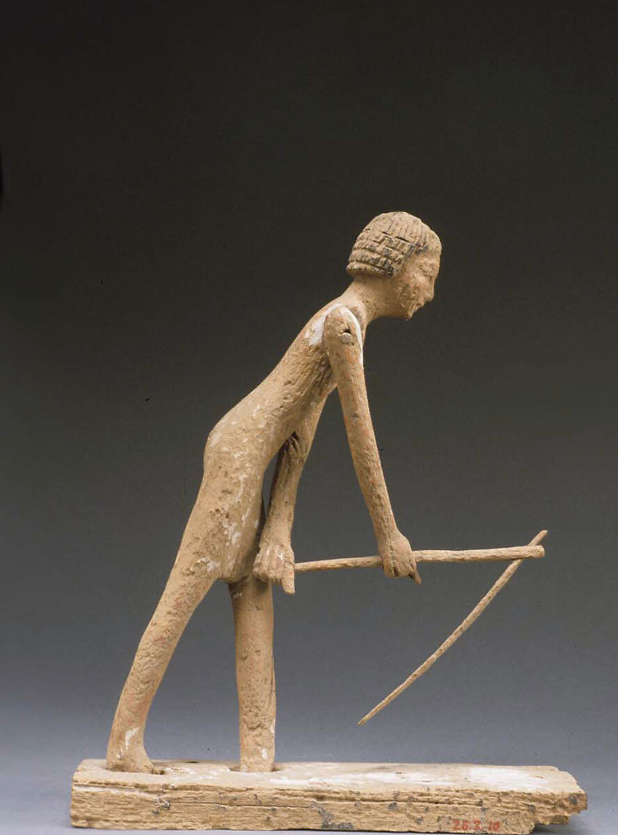 Statue of man hoeing from tomb of Tjeteti, Wood