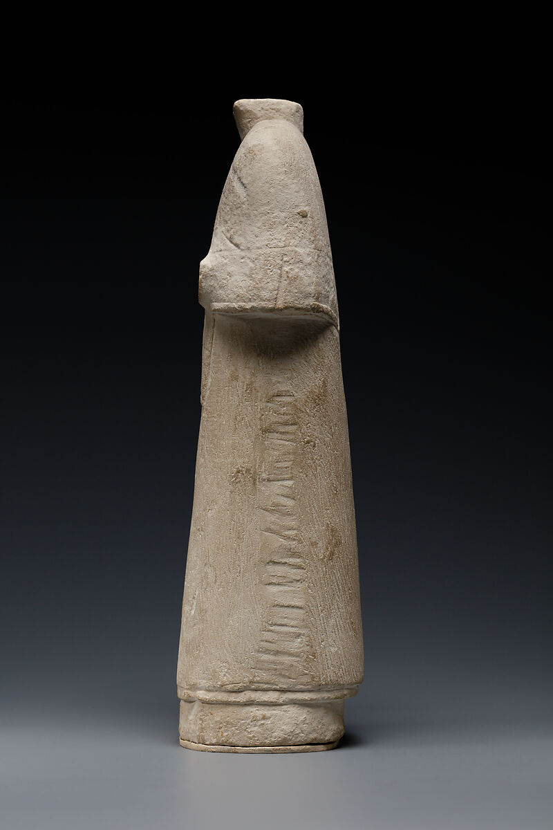 Incomplete figure in draped costume, Limestone