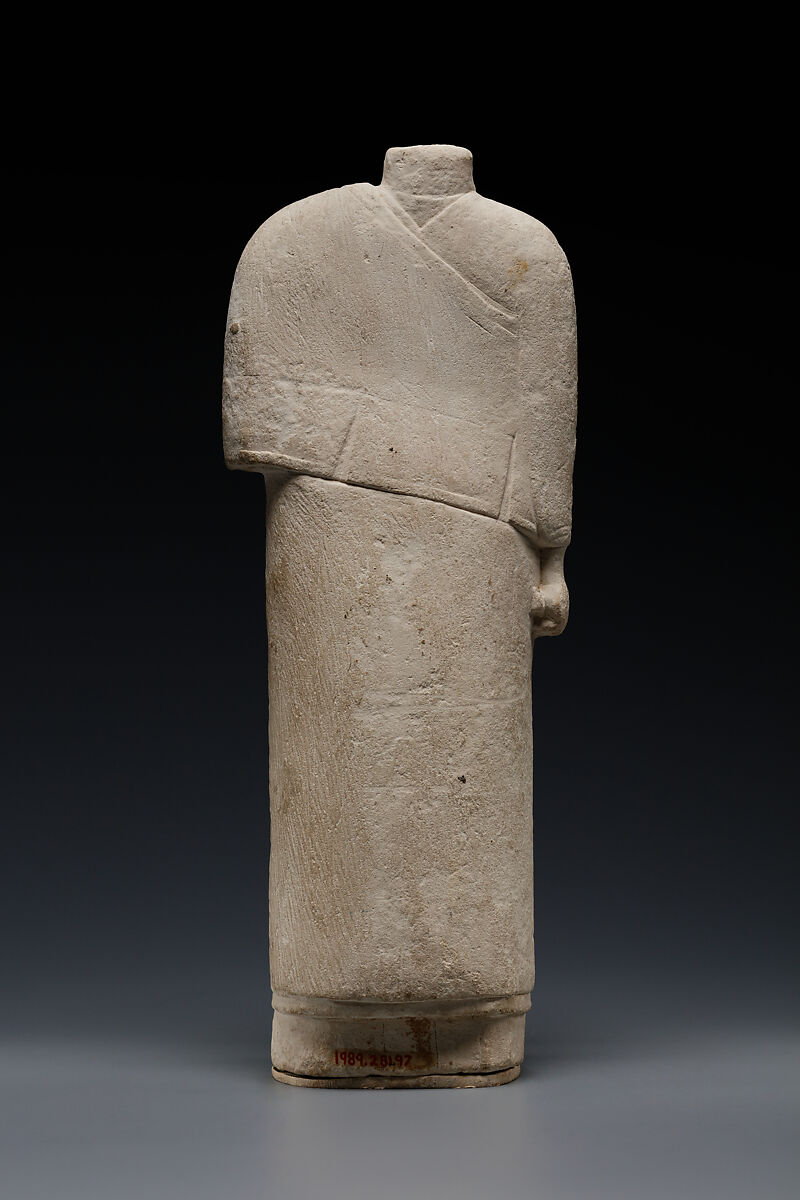 Incomplete figure in draped costume, Limestone