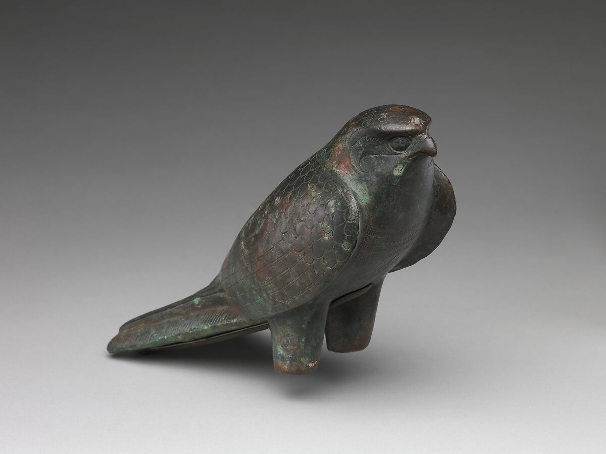Falcon statue serving as a sarcophagus for a sacred animal, Cupreous metal, animal remains