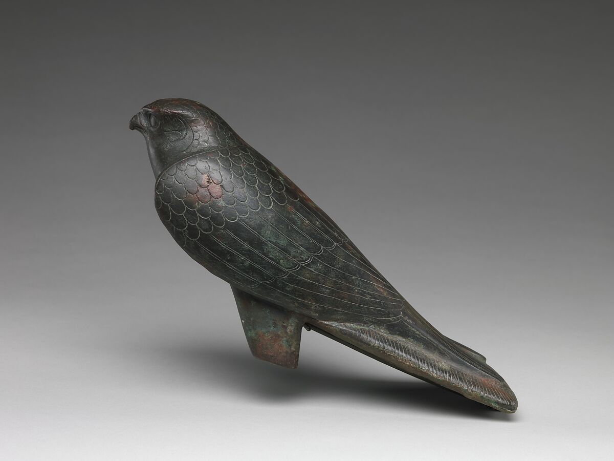 Falcon statue serving as a sarcophagus for a sacred animal, Cupreous metal, animal remains