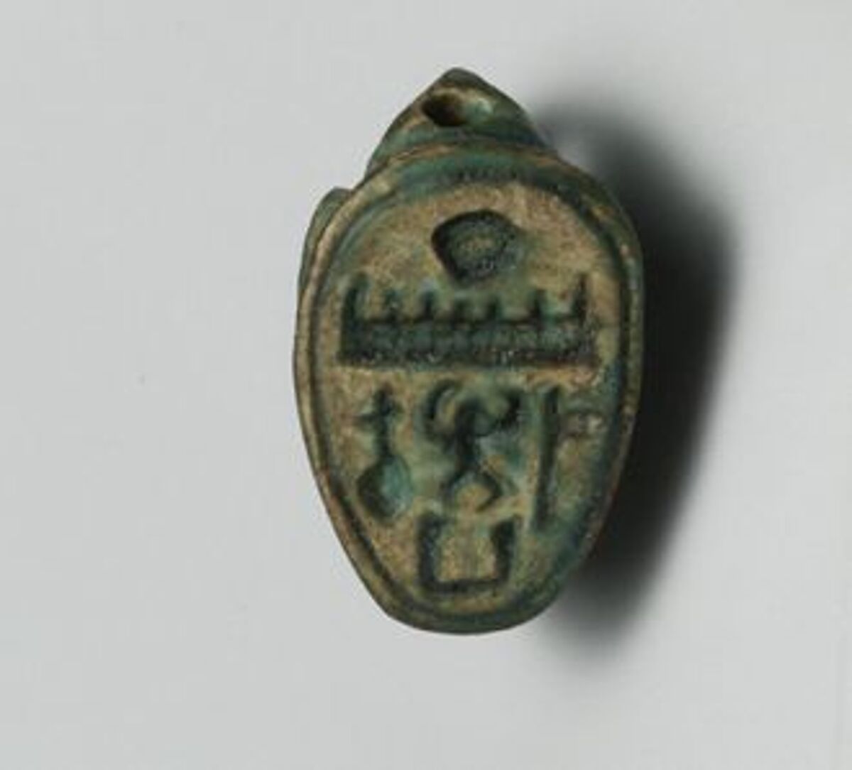 Design amulet in the form of a duck, Glazed steatite