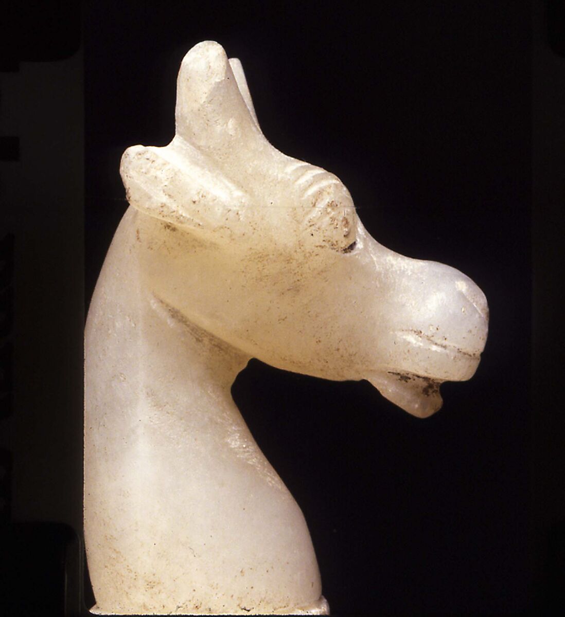 Cosmetic Spoon in the Shape of Swimming Woman Holding a Dish, Travertine (Egyptian alabaster), steatite