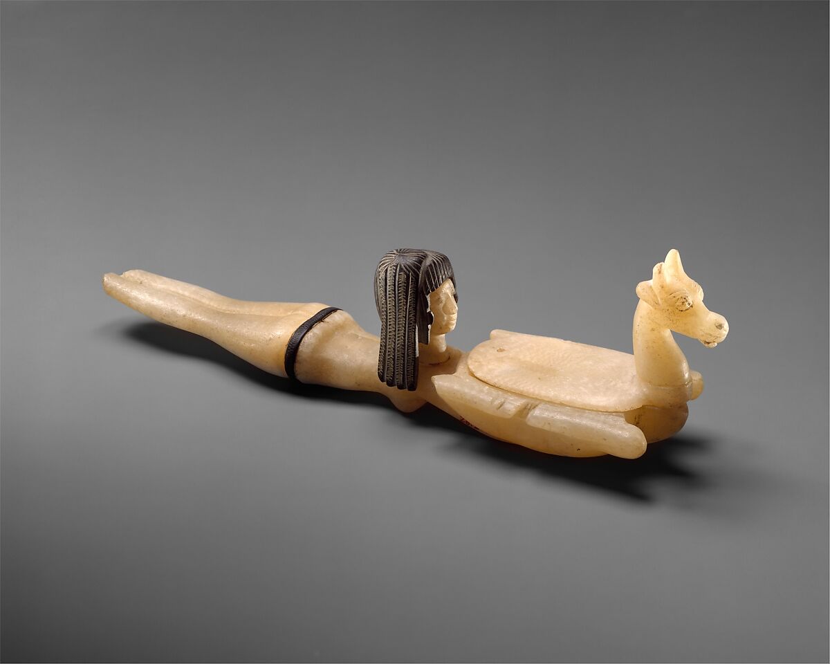 Cosmetic Spoon in the Shape of Swimming Woman Holding a Dish, Travertine (Egyptian alabaster), steatite 