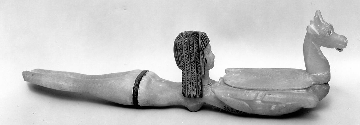Cosmetic Spoon in the Shape of Swimming Woman Holding a Dish, Travertine (Egyptian alabaster), steatite