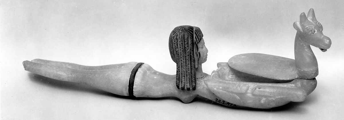 Cosmetic Spoon in the Shape of Swimming Woman Holding a Dish, Travertine (Egyptian alabaster), steatite