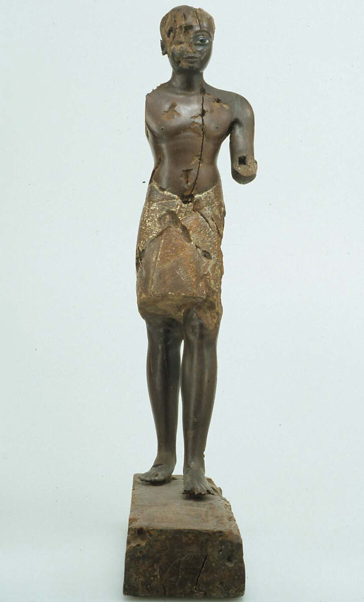 Statuette of a Young Man, Wood (probably ebony), gesso, linen, glass inlay