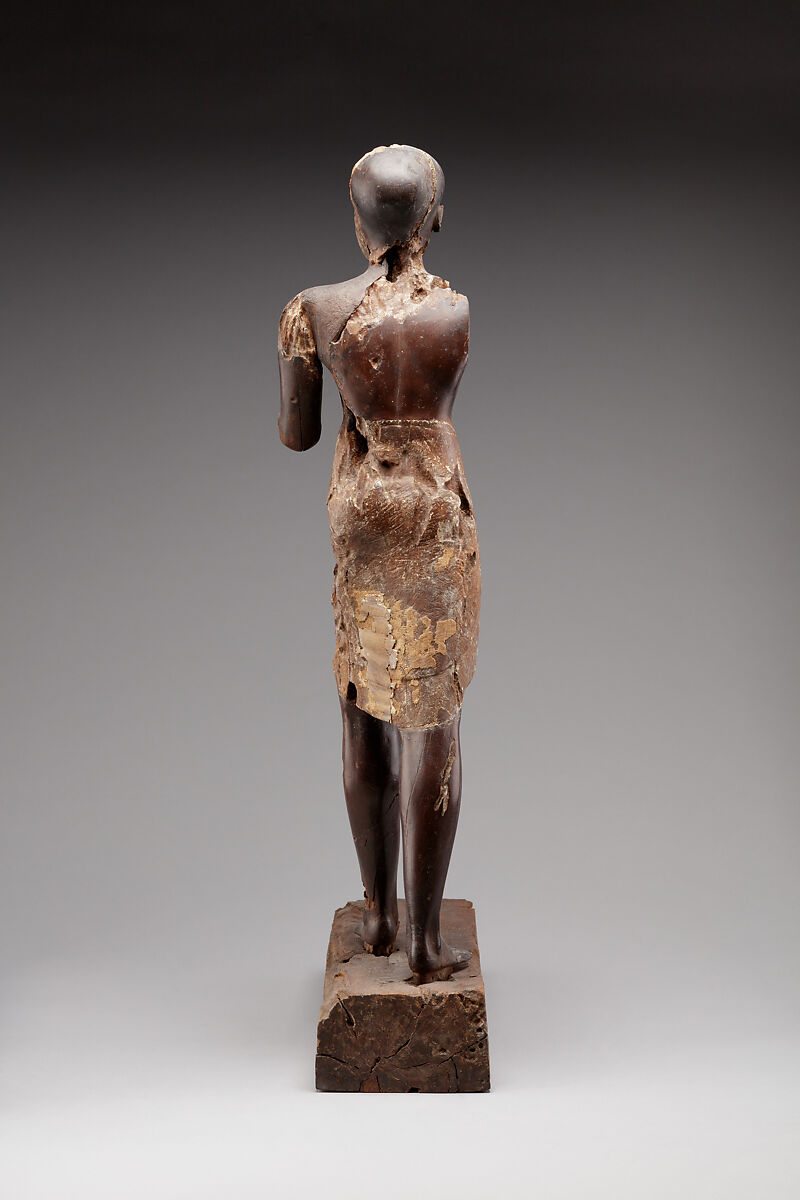 Statuette of a Young Man, Wood (probably ebony), gesso, linen, glass inlay