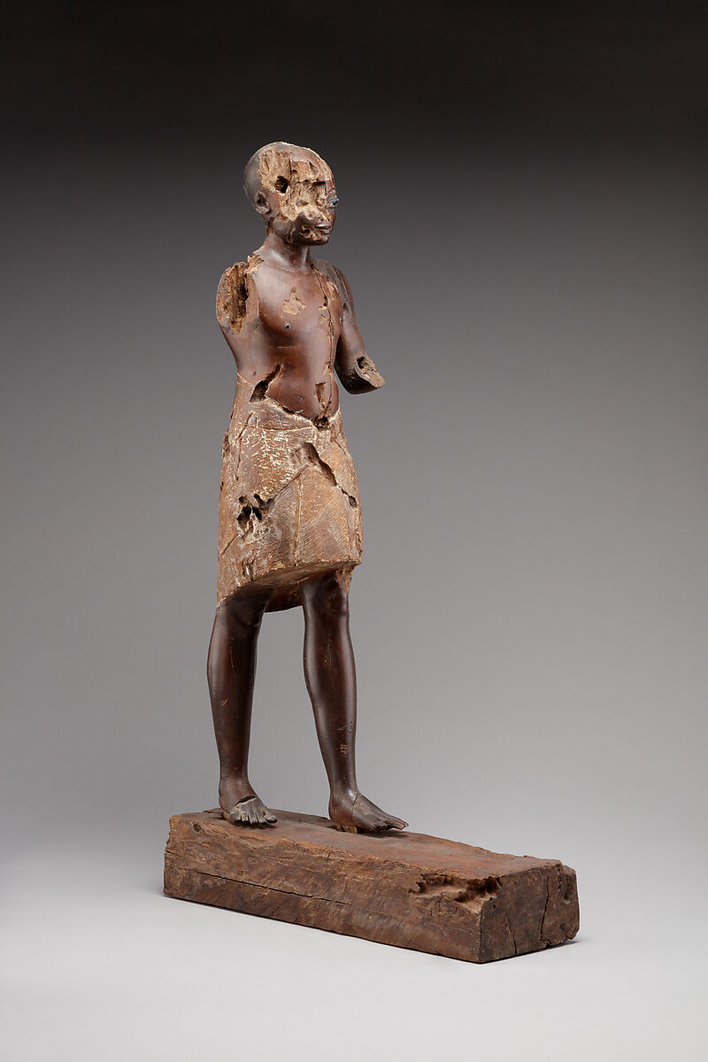 Statuette of a Young Man, Wood (probably ebony), gesso, linen, glass inlay