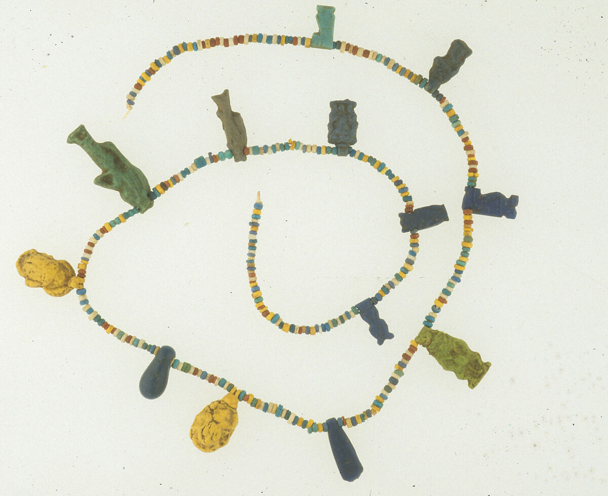 Necklace with Amulets, Faience (green, yellow, grey); glass (violet)
