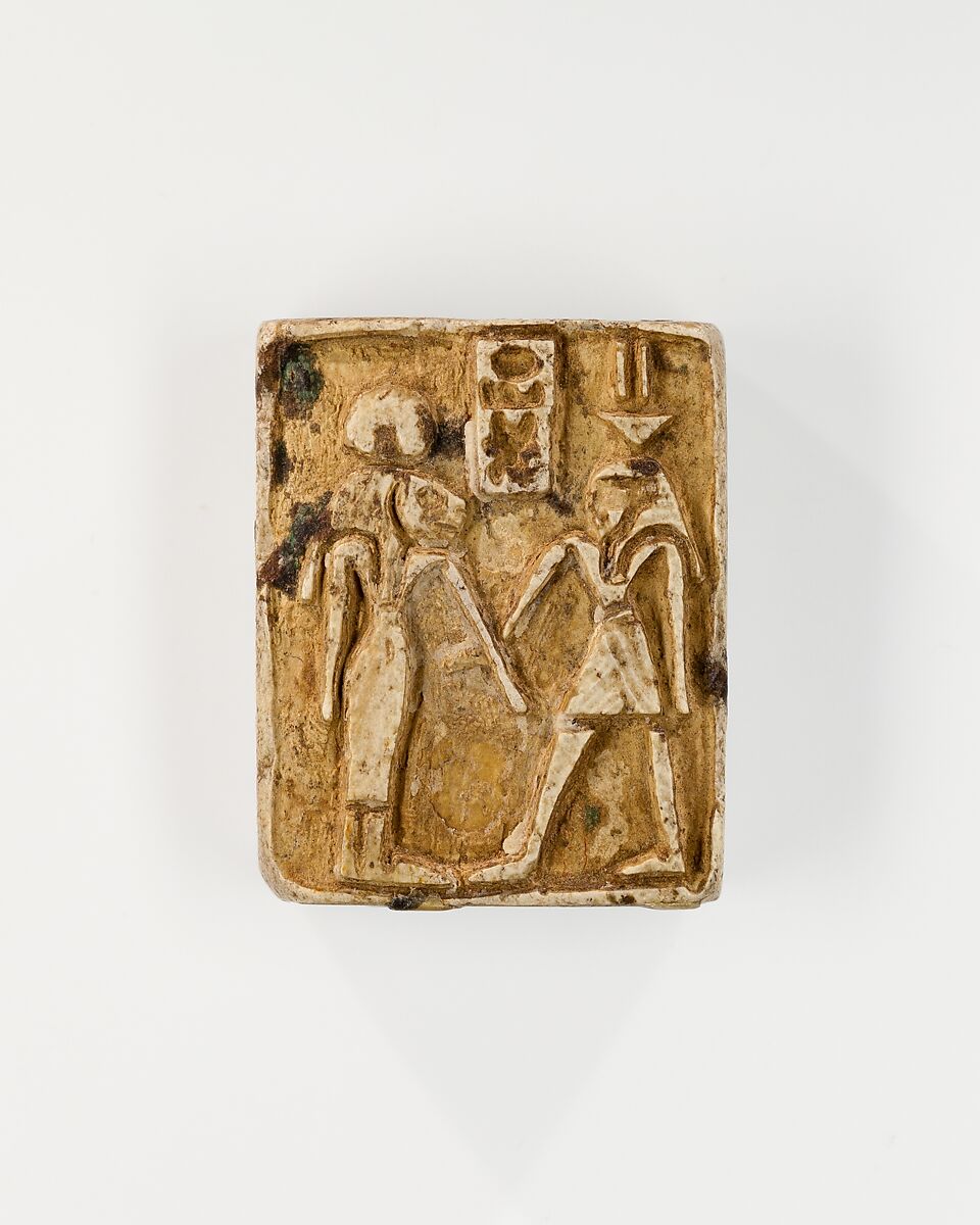 Plaque: side 1, Sakhmet and Nefertum on either side of the name Menkheperre (Thutmose III); side 2, rider and trampled captive, Steatite