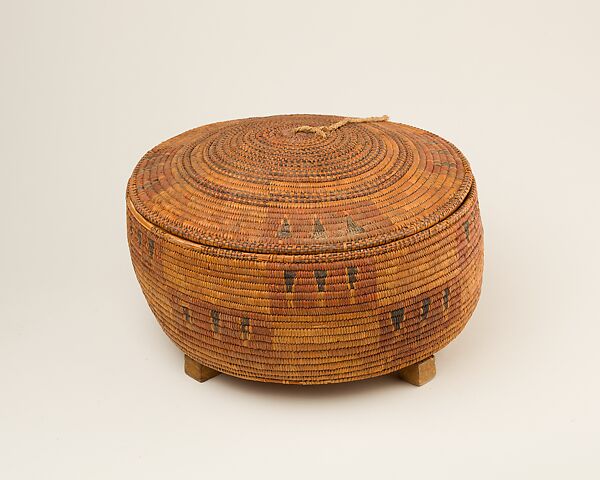 Circular Lided Basket on a Wood Stand