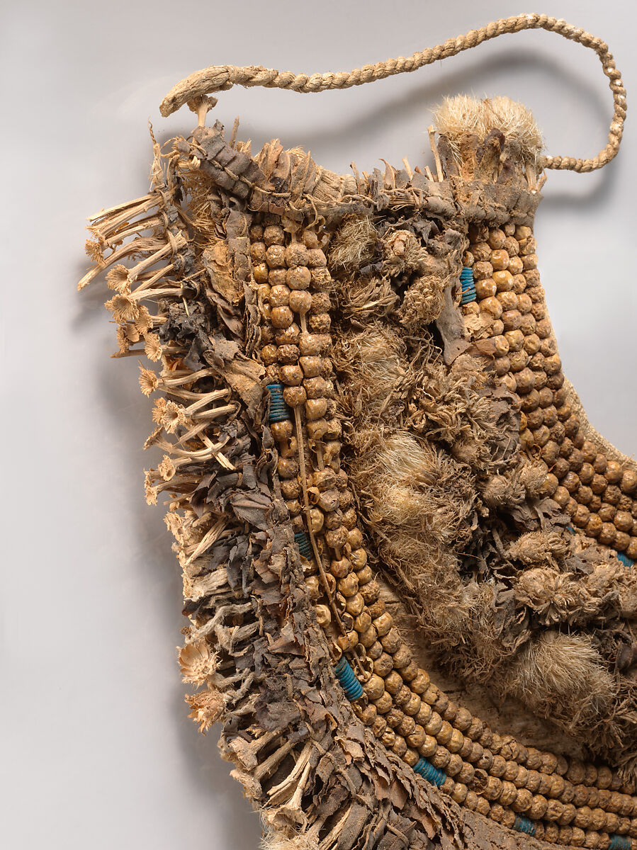 Floral Collar from Tutankhamun's Embalming Cache, Papyrus, olive leaves, persea leaves, cornflowers, blue lotus petals, Picris flowers, nightshade berries, faience, linen