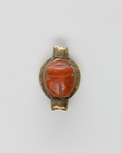 Scarab set in a ring bezel