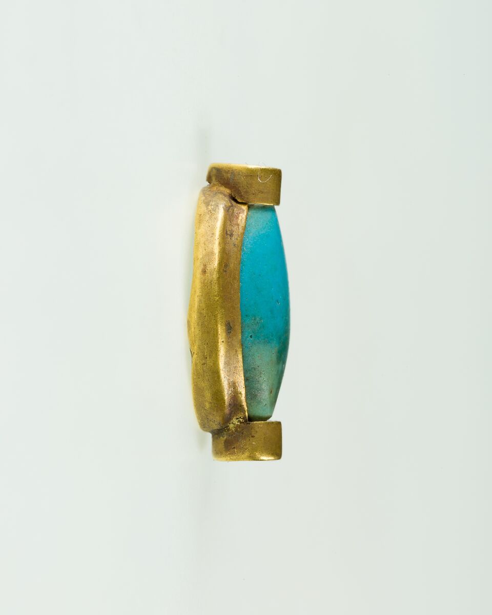 Cowroid Set in a Ring Bezel, Gold, glassy faience